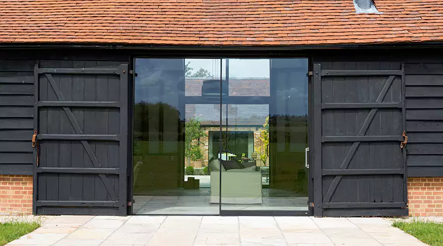 How to Choose the Track & Hardware for a Sliding Garage Door: What You Need to Know?